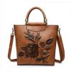 custom brown embossed floral leather handbag